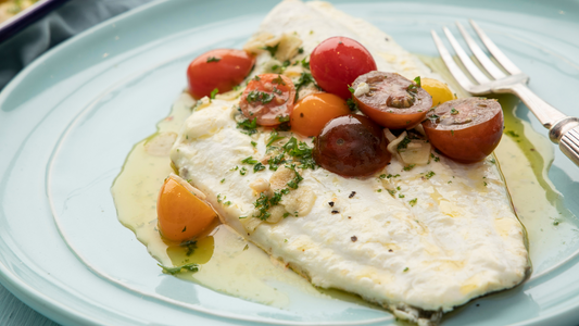 Grilled plaice with garlic and parsley butter