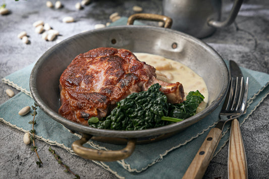 Grilled bacon chop with Parmesan creamed cannellini beans