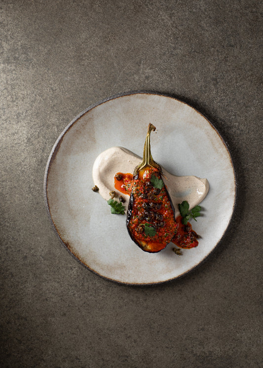 Aubergine, black sesame yogurt, zhoug, fried capers